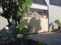 1 - One of the twin entrance gates to the U-shape driveway..jpg